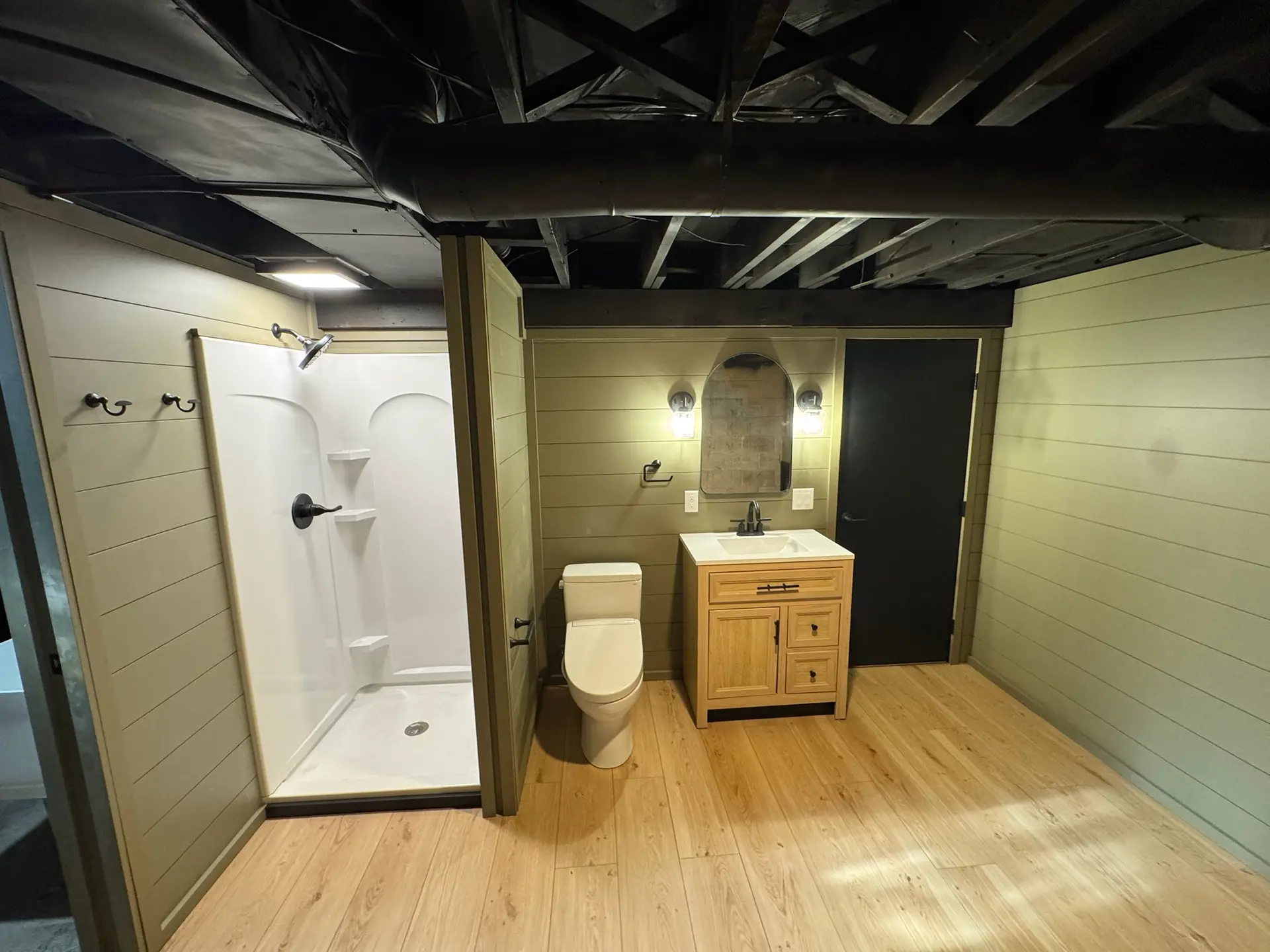 Basement bathroom renovation and remodel by Bergeron Builders